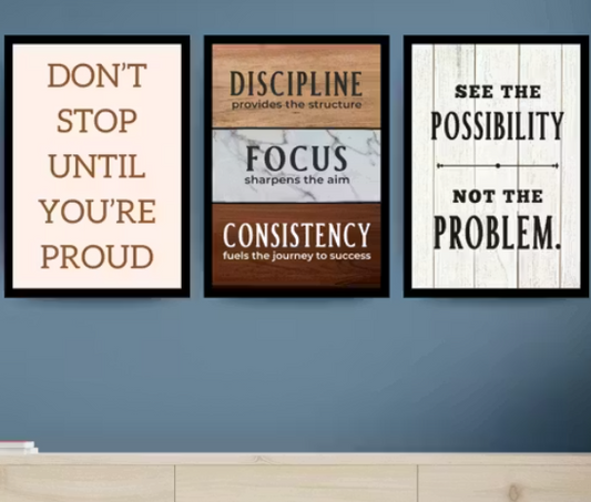 Three motivational posters on a wall with inspirational quotes.
